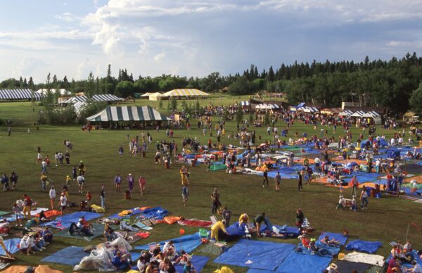 Crane shot of festival site with big clouds in distance-WKaiser-1993